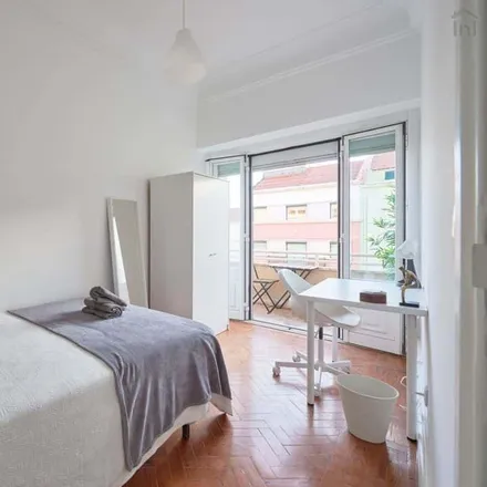 Rent this 12 bed room on Avenida Almirante Reis 219 in 1900-183 Lisbon, Portugal
