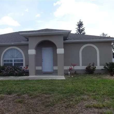 Rent this 4 bed house on 1241 Northeast 12th Place in Cape Coral, FL 33909
