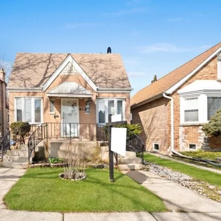 Buy this 3 bed house on 3124 North Oconto Avenue in Chicago, IL 60634