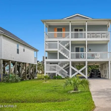Buy this 4 bed house on 128 West Dolphin Drive in Oak Island, Brunswick County