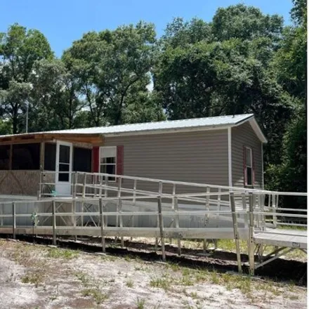 Buy this studio apartment on 7990 Northwest 150th Street in Levy County, FL 32693