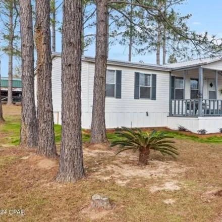 Buy this studio apartment on 2300 Neil Lane in Holmes County, FL 32425