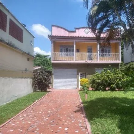 Buy this 4 bed house on Rua Crisantemos in Parque Araruama, São João de Meriti - RJ