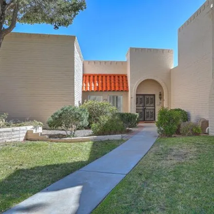 Buy this 2 bed townhouse on 1381 Wagon Train Drive Southeast in Four Hills (HOA), Albuquerque