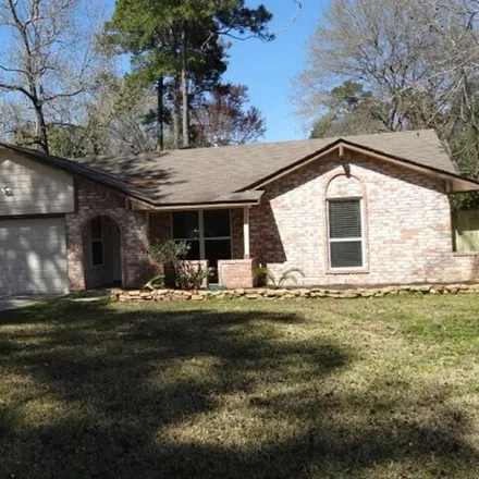 Rent this 3 bed house on 3438 Dovie Drive in Montgomery County, TX 77380
