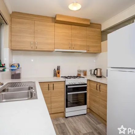 Rent this 3 bed apartment on Elanora Road in Armadale WA 6112, Australia