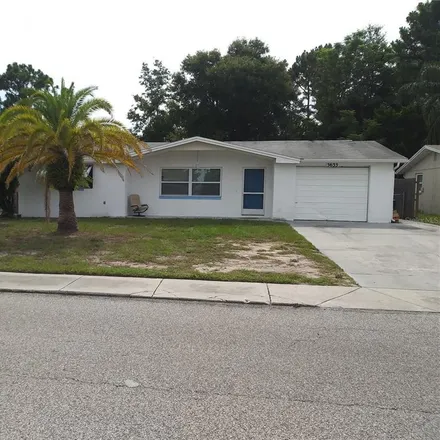 Rent this 2 bed house on 3636 Woodcock Drive in Elfers, FL 34652