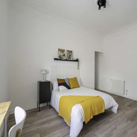 Rent this 4 bed room on Madrid in Calle de Joaquín María López, 48