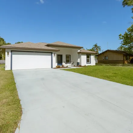 Buy this 4 bed house on The Home Depot in 1140 Malabar Road, Palm Bay