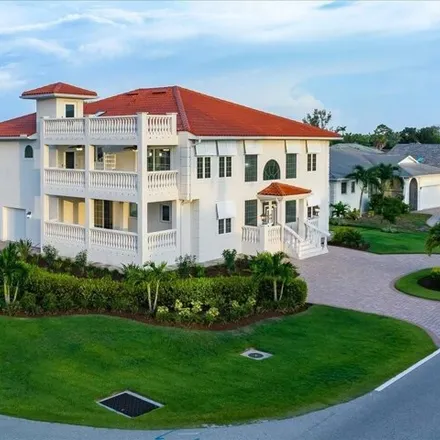 Buy this 6 bed house on 9948 Vanderbilt Drive in Pelican Bay, FL 34108
