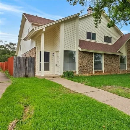 Rent this 3 bed townhouse on 1908 Ridgebrook Drive in Arlington, TX 76015