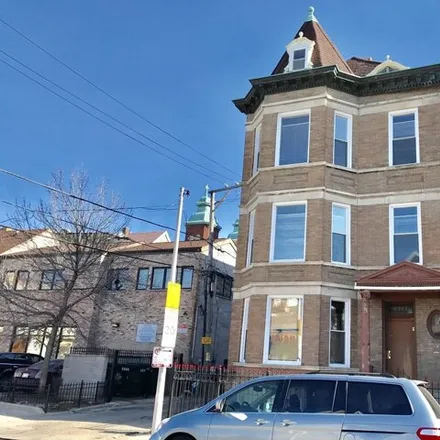 Rent this 4 bed house on 2215 South Albany Avenue in Chicago, IL 60623