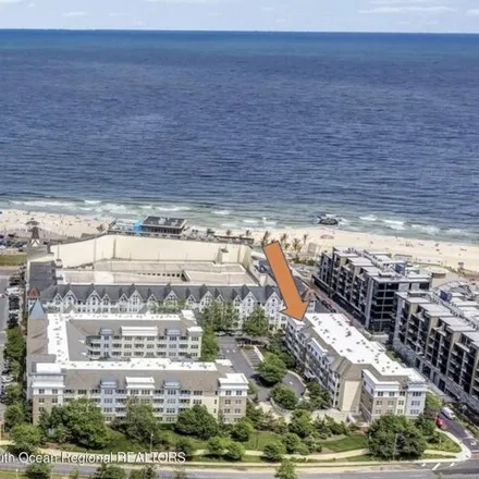 Rent this 2 bed condo on Pier Village Community Pool in Franklin Terrace, East Long Branch