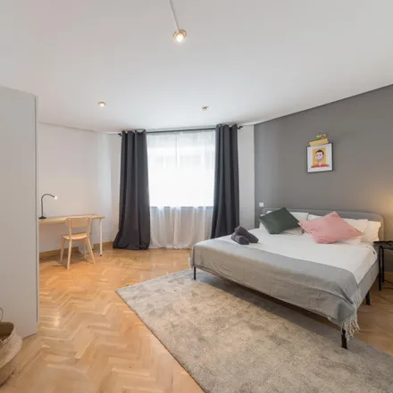 Rent this 5 bed room on Peluquería D-Dos in Calle de Juan Duque, 28005 Madrid