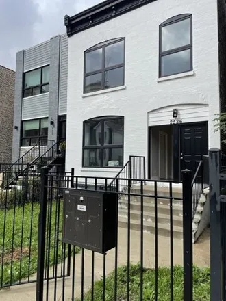 Rent this 3 bed house on 2526 W Lexington St Unit 3 in Chicago, Illinois