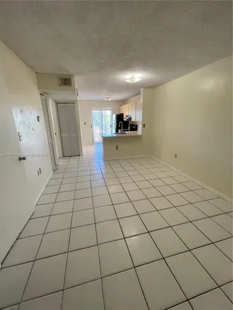 Rent this 2 bed condo on 2565 Southwest 27th Avenue in The Pines, Miami
