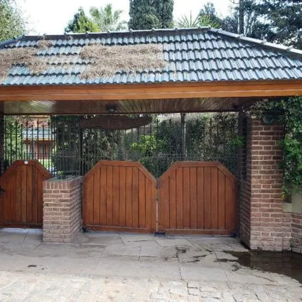 Buy this 6 bed house on Plutón in Partido de Esteban Echeverría, B1839 HBP 9 de Abril