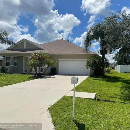 Buy this 4 bed house on 5749 North Belwood Circle South in Port Saint Lucie, FL 34986