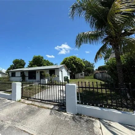 Image 3 - 3372 NW 182nd St, Miami Gardens, Florida, 33056 - House for sale