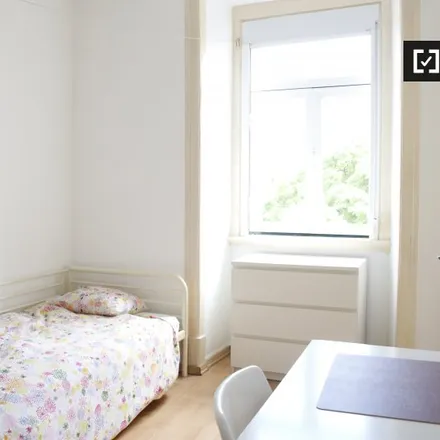 Rent this 6 bed room on Avenida Visconde de Valmor in Avenida Marquês de Tomar, 1050-156 Lisbon