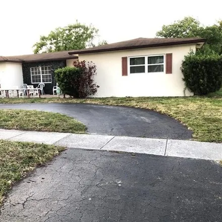 Buy this 3 bed house on 4945 Northwest 16th Street in Lauderhill, FL 33313
