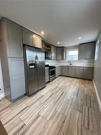 Rent this 3 bed house on 4385 Wickham Avenue in New York, NY 10466
