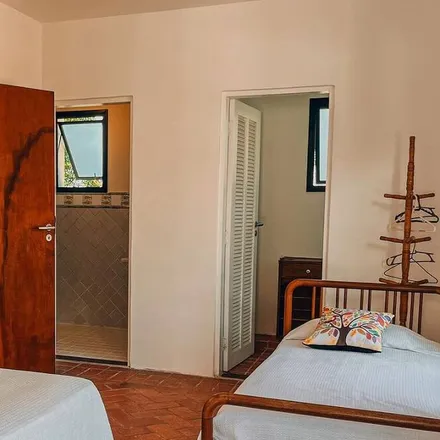 Rent this 5 bed house on Bertioga in Região Metropolitana da Baixada Santista, Brazil
