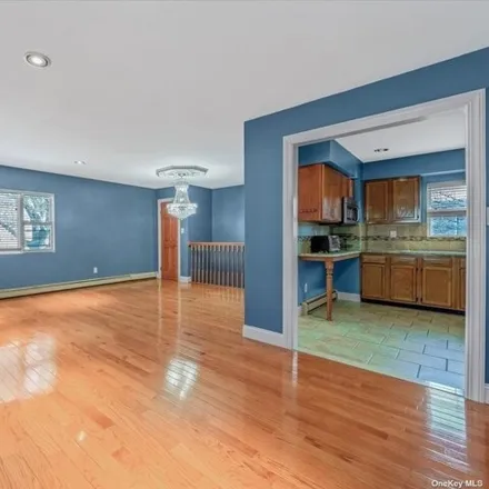 Rent this 3 bed house on 74-10 Atlantic Avenue in New York, NY 11416