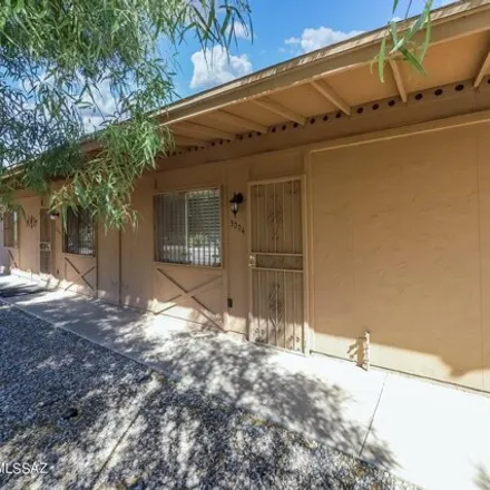 Rent this 2 bed house on 3409 East Blacklidge Drive in Tucson, AZ 85716