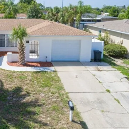 Buy this 2 bed house on 8098 Penwood Drive in Jasmine Estates, FL 34668