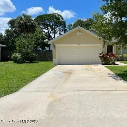 Rent this 4 bed house on 2602 Southover Drive Northeast in Palm Bay, FL 32905