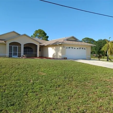 Buy this 4 bed house on 1198 Atherton Avenue in Lehigh Acres, FL 33971