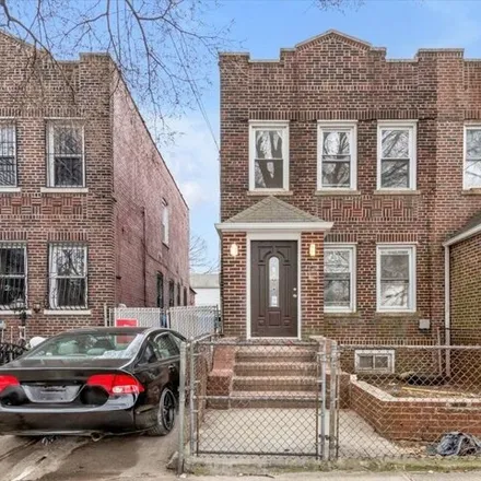 Buy this 4 bed house on 146-04 116th Avenue in New York, NY 11436