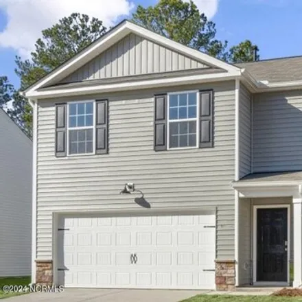 Buy this 4 bed house on 427 Commerce Drive in Sanford, NC 27332