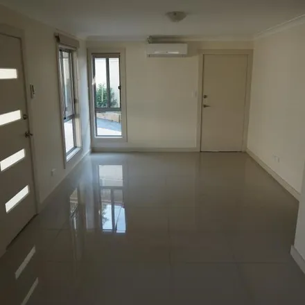 Rent this 2 bed apartment on Coongra Street in Busby NSW 2168, Australia