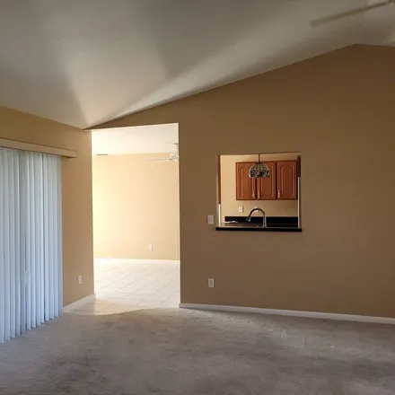 Rent this 3 bed apartment on 4439 Southwest 15th Avenue in Cape Coral, FL 33914
