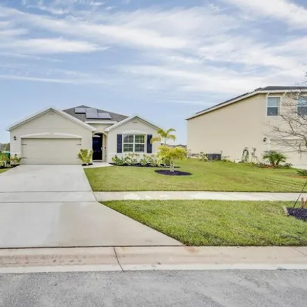 Buy this 4 bed house on 3327 Homestead Dr in Fort Pierce, Florida