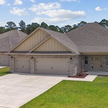 Buy this 4 bed house on 4609 Palmetto Palm Dr in Gulf Breeze, Florida