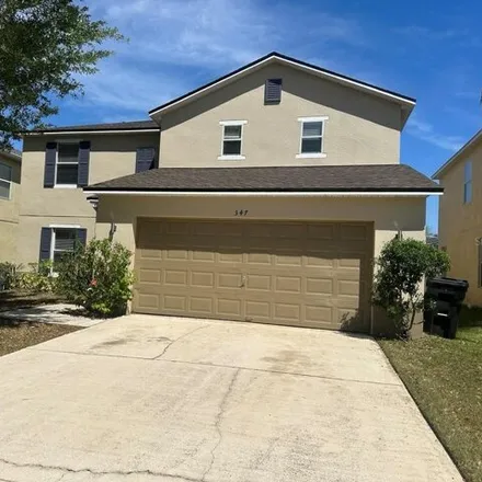Rent this 4 bed house on 355 Alfini Street in Polk County, FL 33896