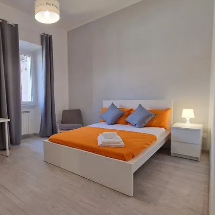 Rent this 4 bed room on Via Ostiense 343 in 00145 Rome RM, Italy