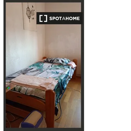Rent this 3 bed room on Calle de Armengot in 7, 28019 Madrid