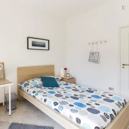 Rent this 4 bed room on Via delle Acacie 5 in 20094 Cesano Boscone MI, Italy