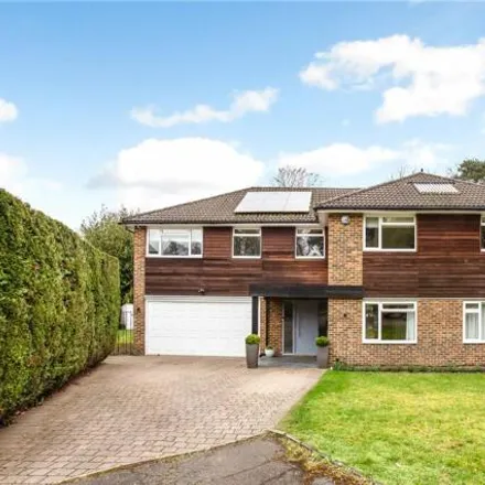 Buy this 4 bed house on Milner Drive in Elmbridge, KT11 2EZ