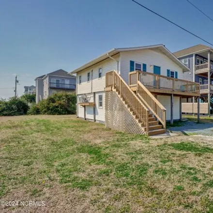Buy this 4 bed house on 3299 Island Drive in Ocean City Beach, North Topsail Beach