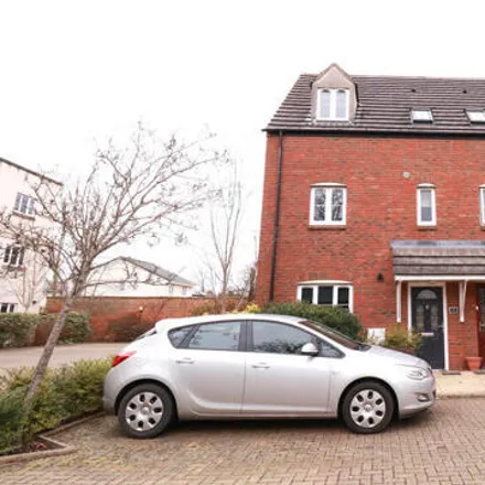 Rent this 3 bed townhouse on Reed Court in Stratton St Margaret, SN3 4GA
