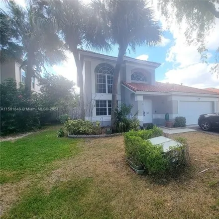 Buy this 4 bed house on 603 Northwest 133rd Way in Plantation, FL 33325
