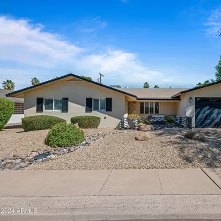 Buy this 4 bed house on 8332 East Minnezona Avenue in Scottsdale, AZ 85251