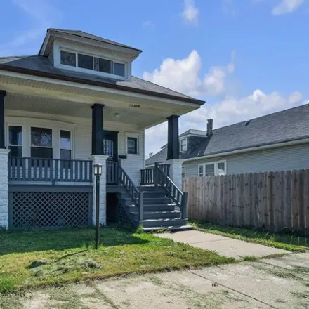 Buy this 5 bed house on 1409 West 71st Place in Chicago, IL 60636