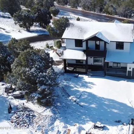 Buy this 5 bed house on 4910 West Mountain Hollow Loop in Show Low, AZ 85901