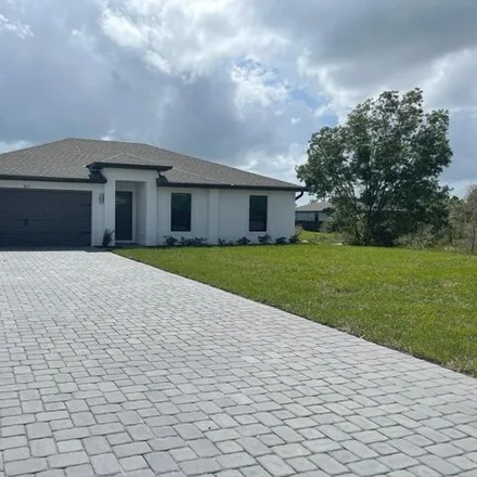 Rent this 3 bed house on 810 Winwood Circle in Lehigh Acres, FL 33970